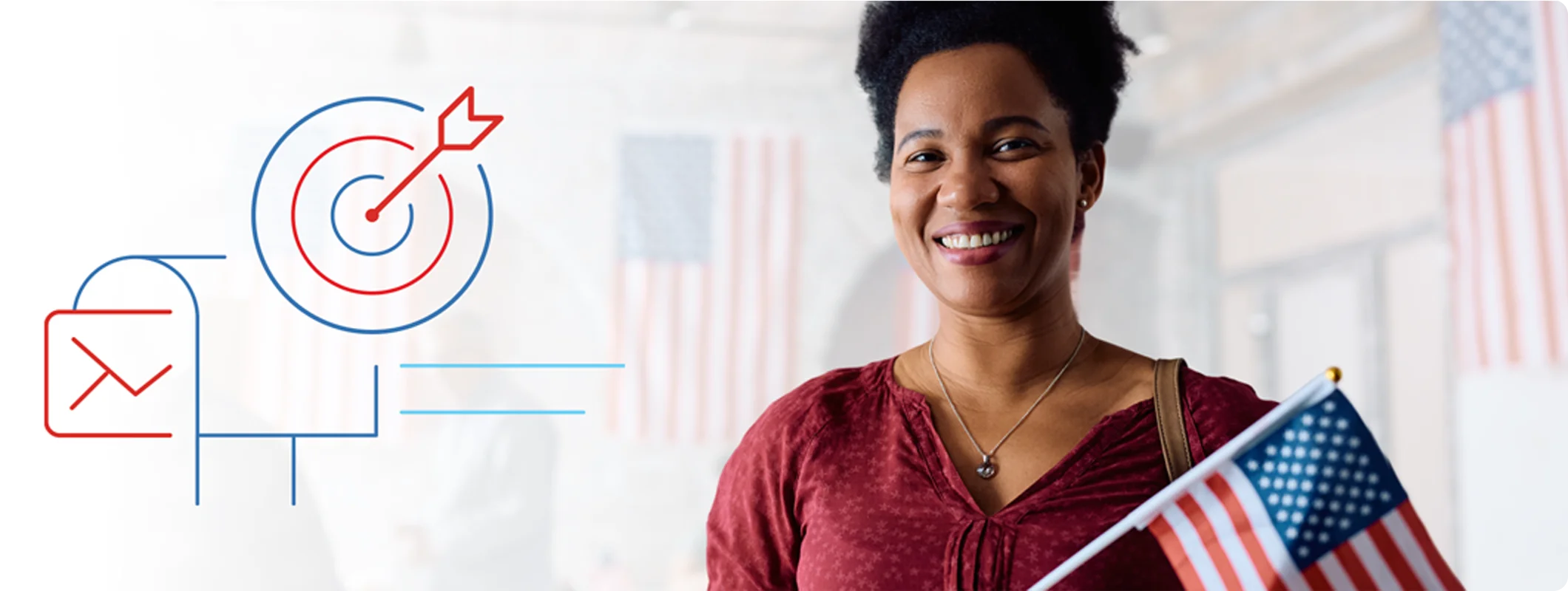 Woman standing in a room with American flags on the walls behind her while holding a hand-wave rally flag.