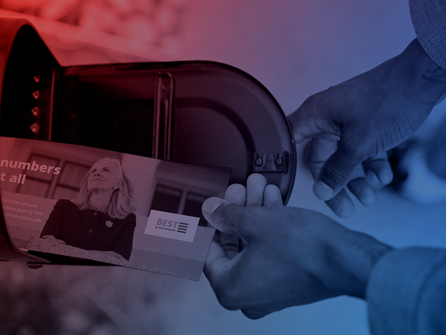 Close up of hands pulling a direct mail piece out of a mailbox.